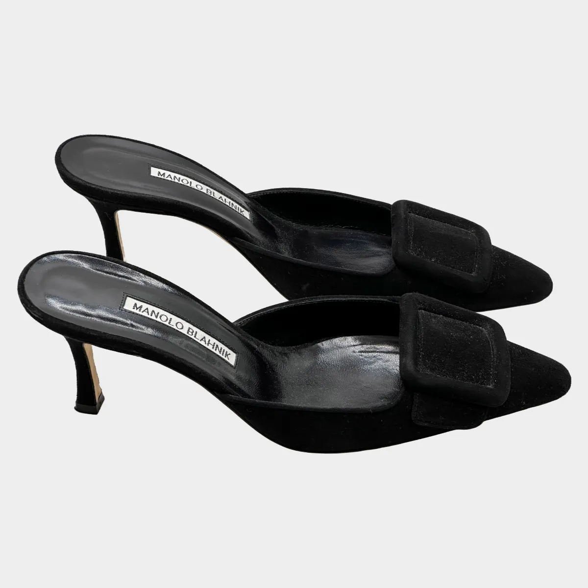 Manolo Blahnik black suede open back pumps with buckle detail at the toes