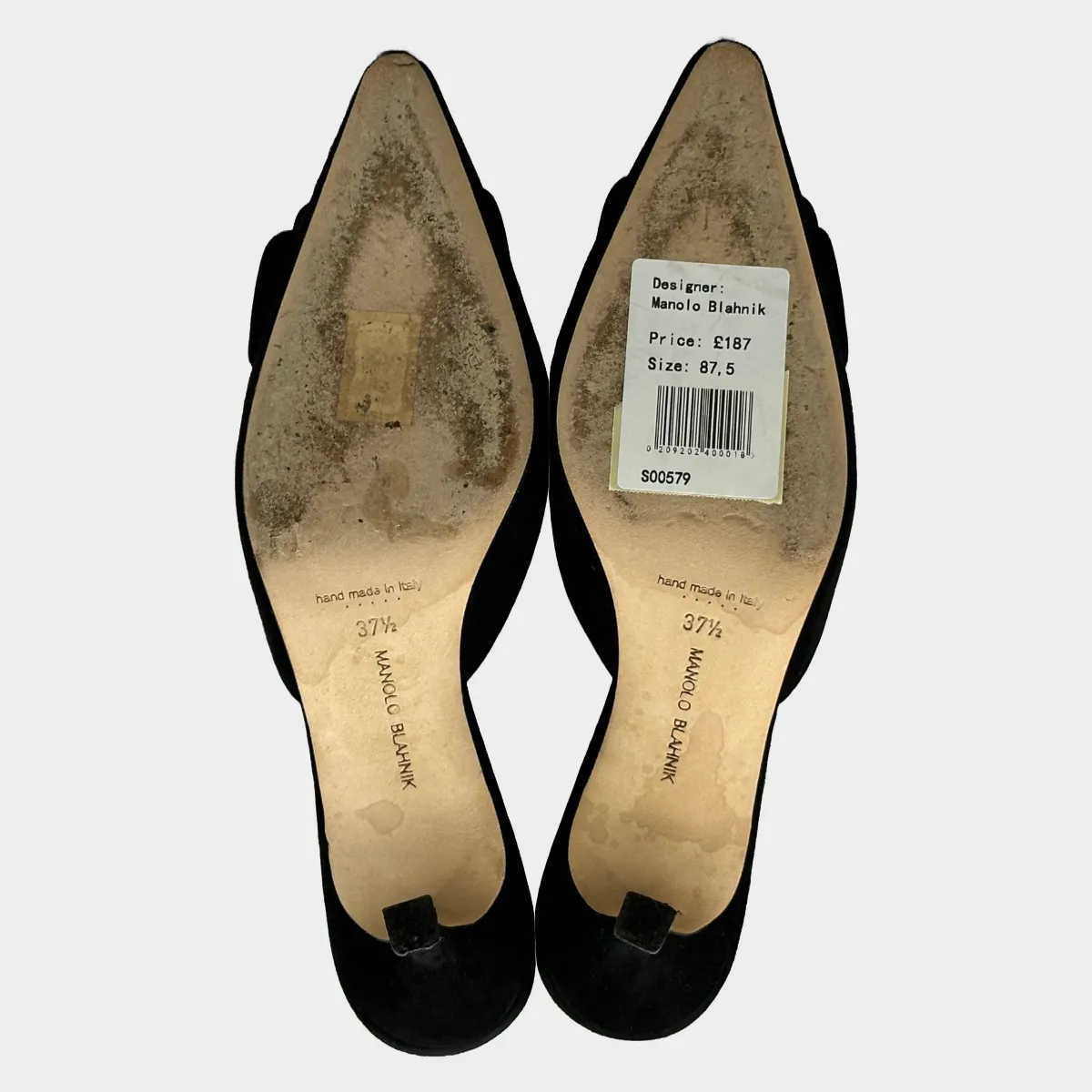 Manolo Blahnik black suede open back pumps with buckle detail at the toes